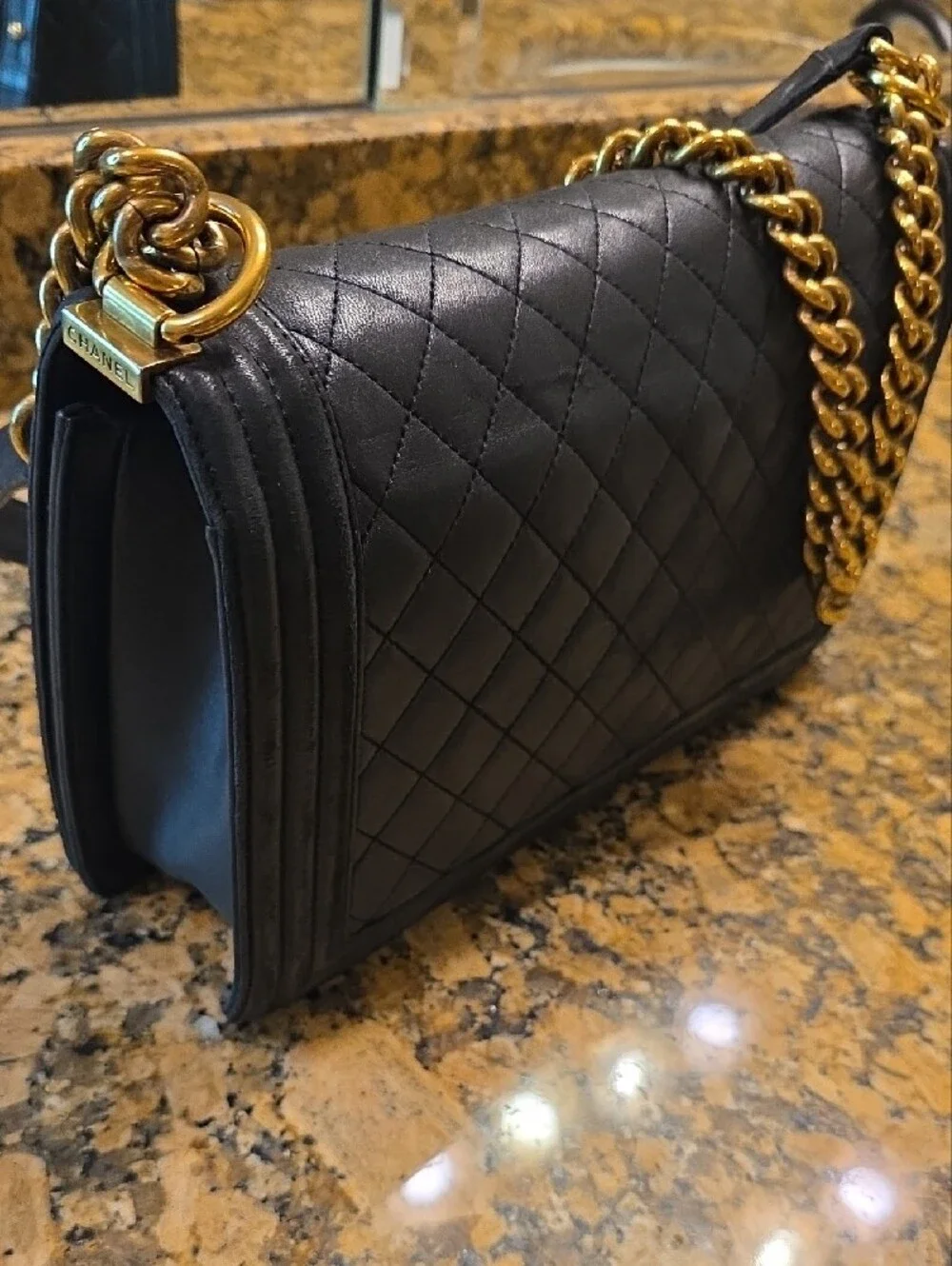 CHANEL Medium Boy Bag Quilted Lambskin Crossbody with Gold Hardware.
